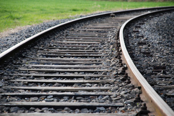 Fototapeta premium Bahnschienen in der Kurve