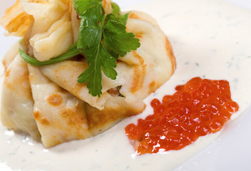 tasty home pancakes with   red caviar