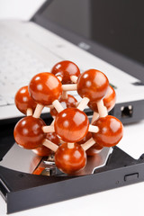 Laptop with open CD tray.