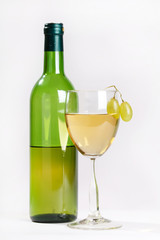 Glass of wine with grape