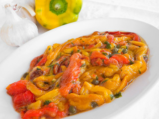 Roasted Bell Pepper Salad on white dish.