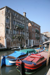 Fototapeta na wymiar Barges on backwater, Venice