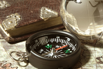 Compass on the old map