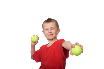 Little boy with balls for tennis