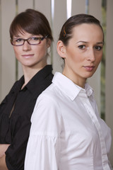 two businesswomen in office