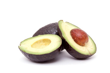 Whole and cut avocados