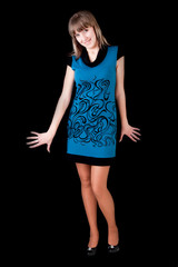 girl in blue dress over black