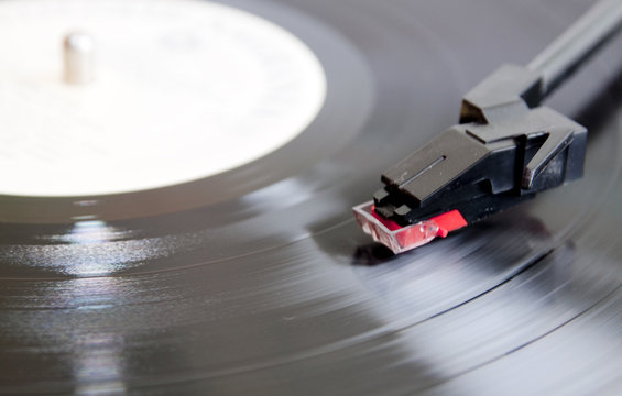 Vinyl record spinning on turntable