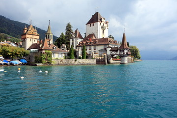 Fototapeta na wymiar Oberhofen castle on Lake Thun of Jungfrau region in Switzerland