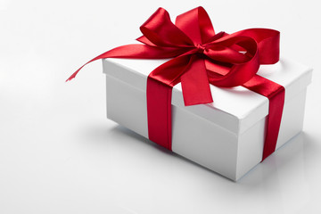 Gift decorated with a tape and a bow