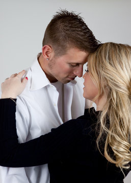 Couple hugging and kissing