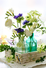 Bouquet of flowers( ranunculus; anemone; freesia,hellebore)