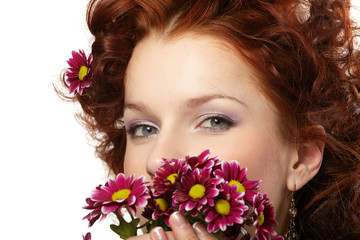 Naklejka premium Portrait of a happy women with flowers