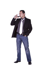 Businessman celebrating with a glass of drink