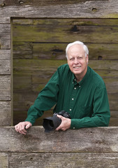 Photographer holding camera