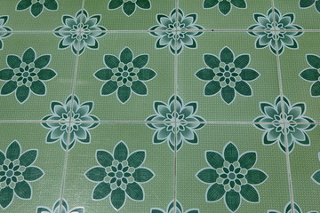Carrelage vert à fleurs