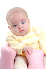 Young baby girl in chair