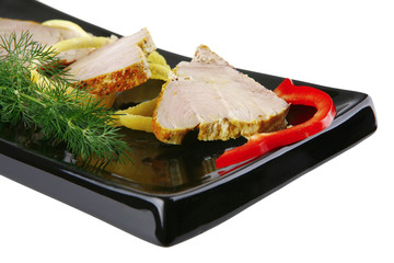roast tuna slices with vegetables on plate