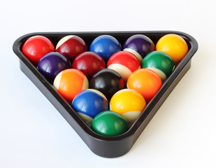 Brightly colored pool or billiard balls on white