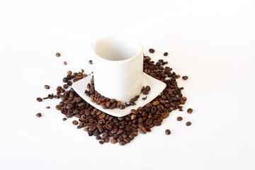 coffee mug spoon with spilled coffee on white