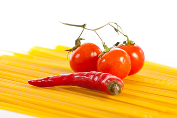 Pasta and tomatoes and red hot chilli peppers