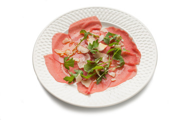 carpaccio with parmesan cheese and rucola