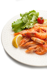 dish with boiled shrimp and salad