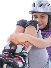young girl on rollerblades