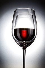 a glass of red wine abstract