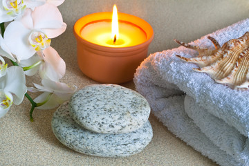 Spa concept white orchid, candle, towel