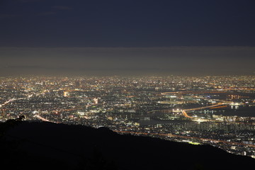 Illuminated Kobe City in Japan at night from high above