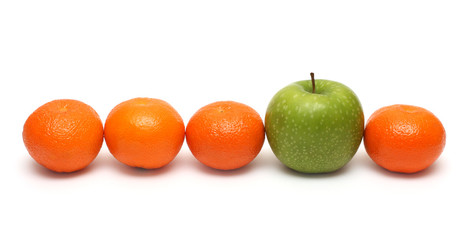different concepts with mandarins and apple