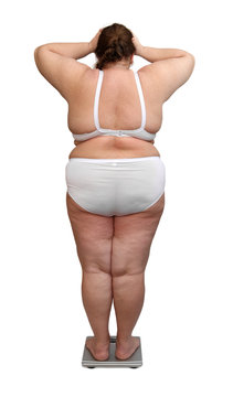 Women With Overweight From Behind On Scales