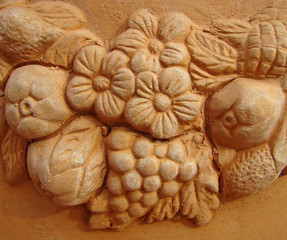 terracotta ornament, detail of huge flowerpot, Italy