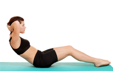 Obraz premium young woman doing sit ups