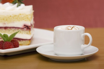 Cappuccino with strawberry cake