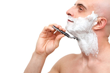 Man shaving with a razorblade
