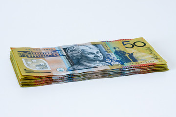 Stack of Australian fifty dollar notes.
