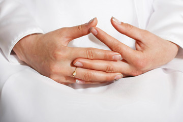 Bride with wedding dress and manicure