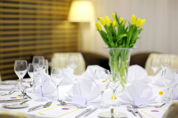 Empty place cards on the festive table