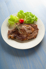 grilled porterhouse with salad