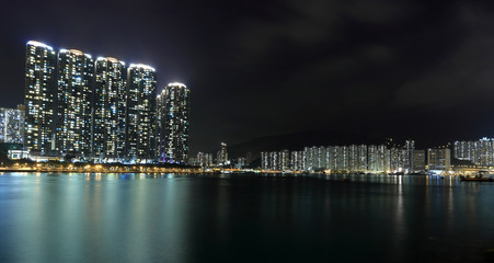Naklejka premium apartment Buildings in Hong Kong at night