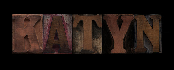 the word Katyn in old wood type