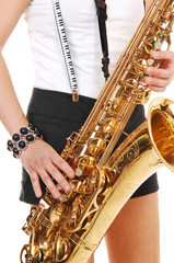 Fototapeta premium Chinese girl playing the saxophone.