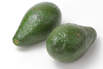 Green avocado isolated on white