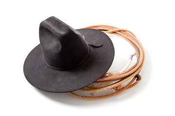 a Cowboy hat and lariat on white
