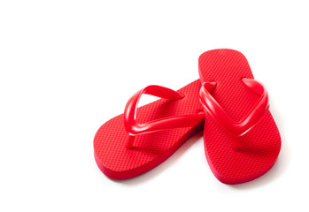 Colored flipflops on a white background