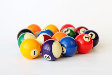 Brightly colored pool or billiard balls on white