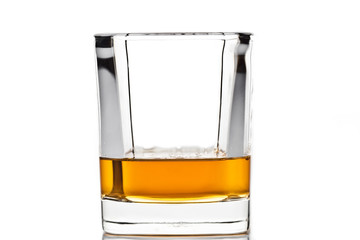 Whiskey glass isolated on white background