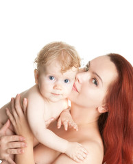 smiling baby and mother after bathing